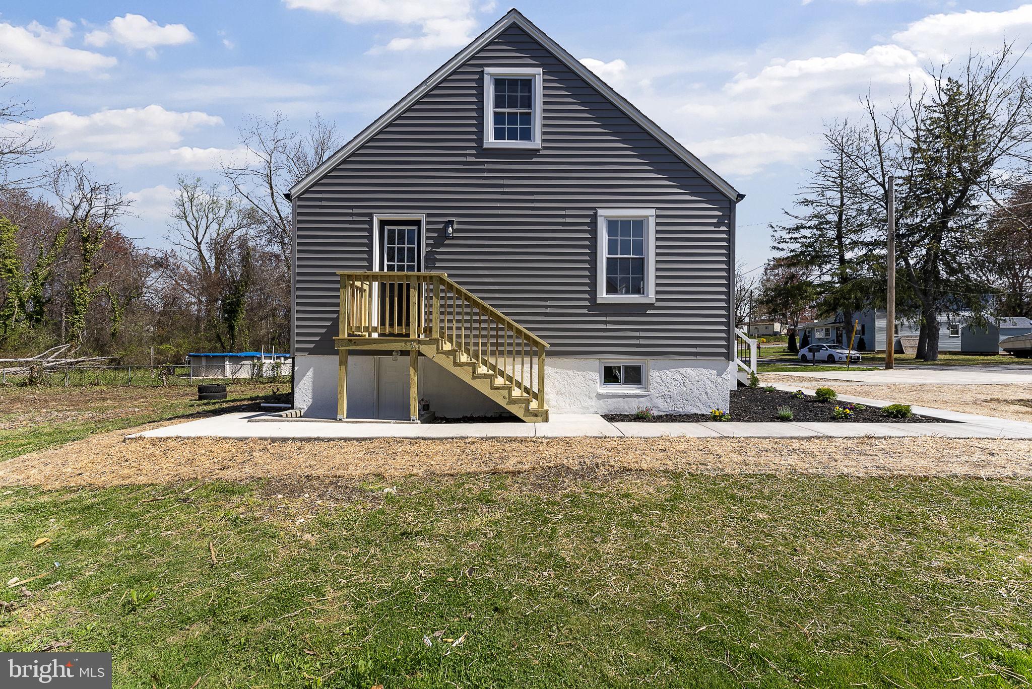 8310 Karl Avenue Rosedale, MD 21237 - Photo 36 of 39 a front view of a house with a yard