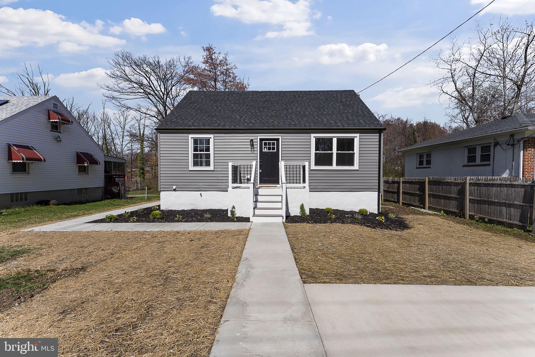 8310 Karl Avenue Rosedale, MD 21237 - Photo 39 of 39 a front view of a house with yard