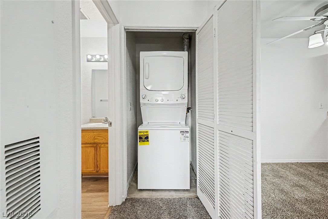 4730 East Craig Road, Unit 2096 Las Vegas, NV 89115 - Photo 25 of 35 Conveniently located laundry facilities provide ease of living within this residence.