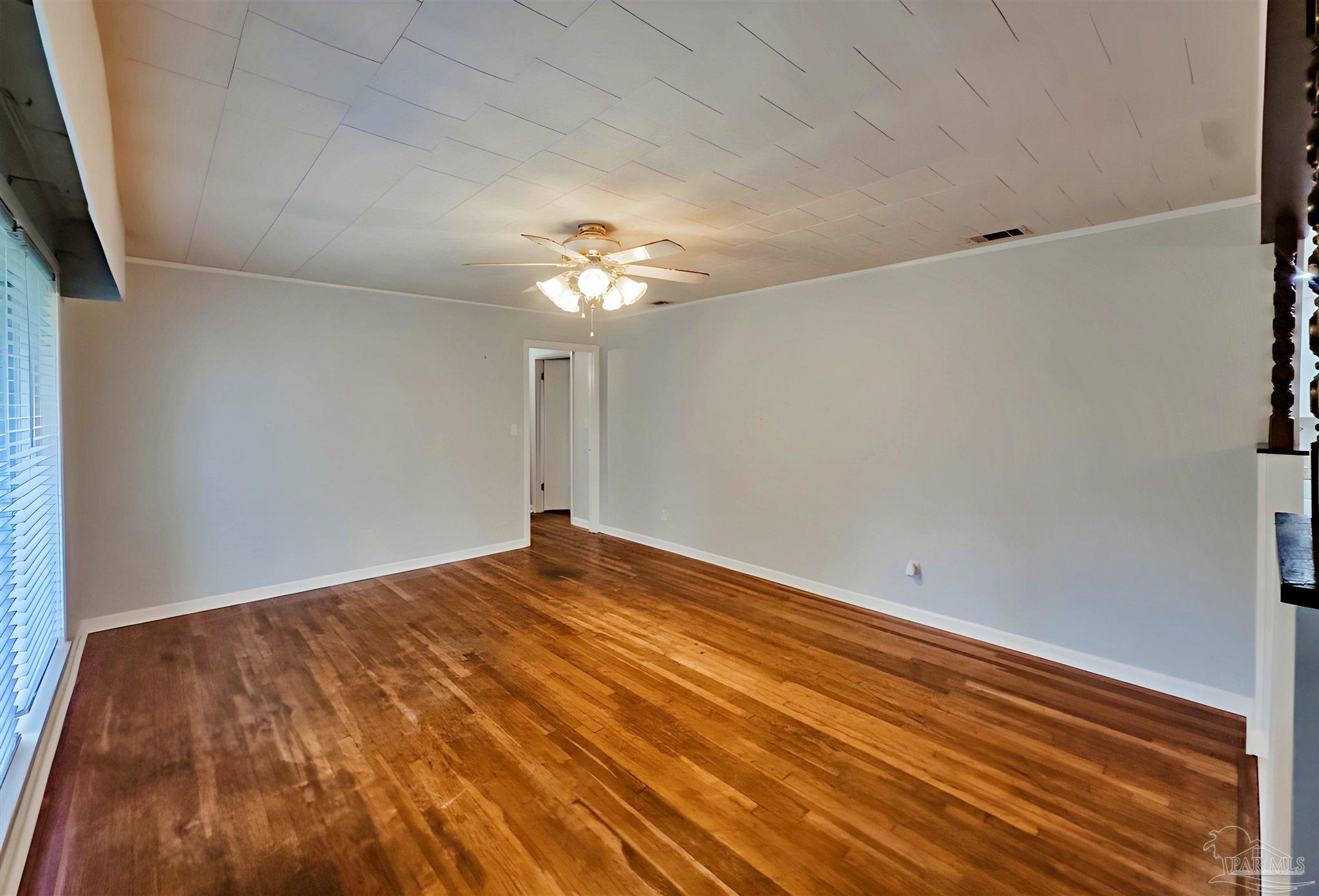 3224 Highway 4 Jay, FL 32565 - Photo 11 of 25 wooden floor in an empty room