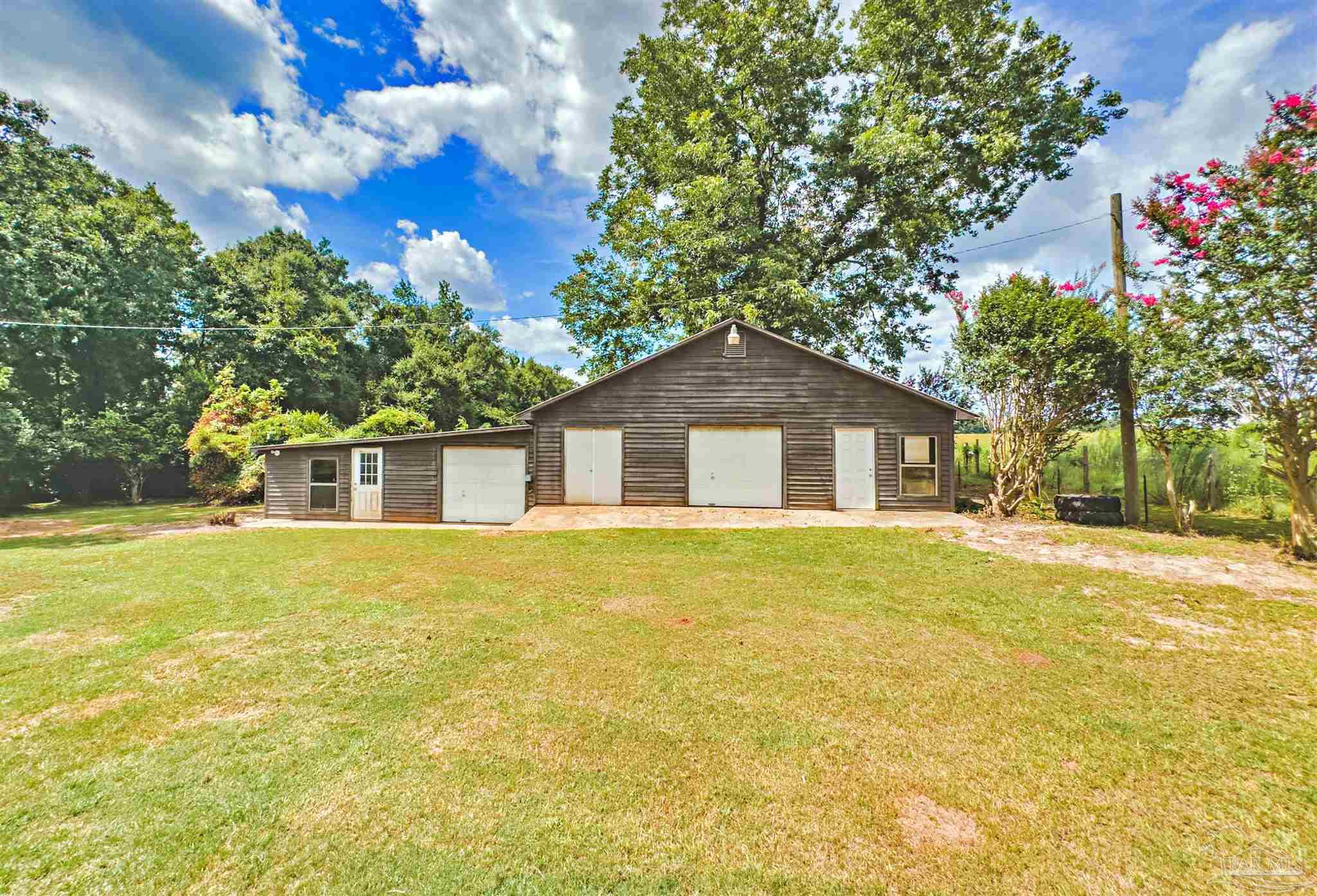 3224 Highway 4 Jay, FL 32565 - Photo 22 of 25 a front of a house with a yard