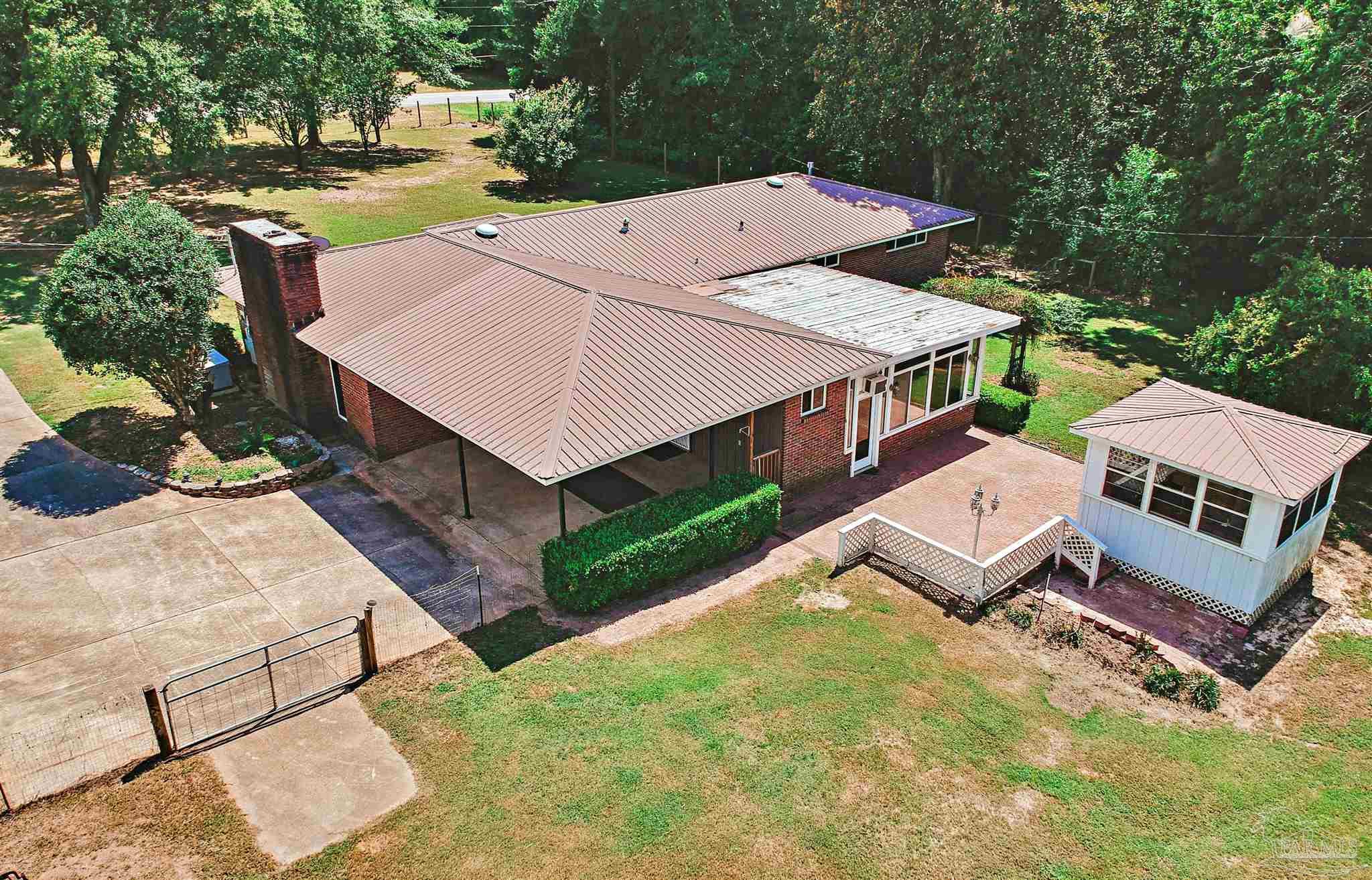 3224 Highway 4 Jay, FL 32565 - Photo 5 of 25 an aerial view of a house with a yard