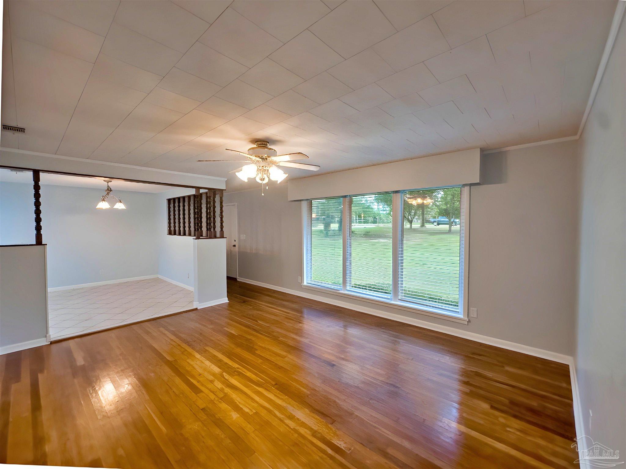 3224 Highway 4 Jay, FL 32565 - Photo 9 of 25 a view of an empty room with window and wooden floor