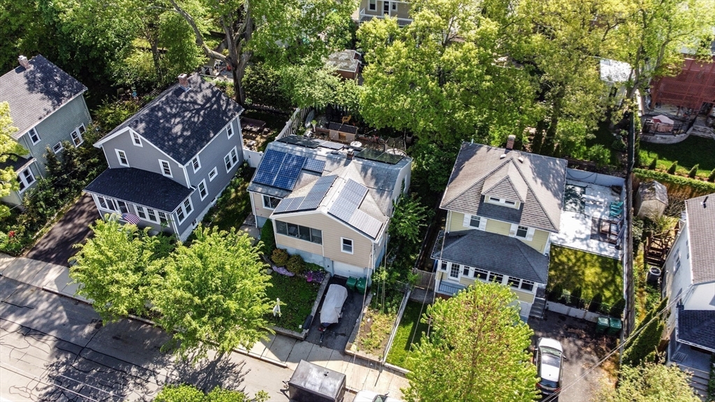 65 Fern Road Medford, MA 02155 - Photo 8 of 32 an aerial view of multiple houses with yard