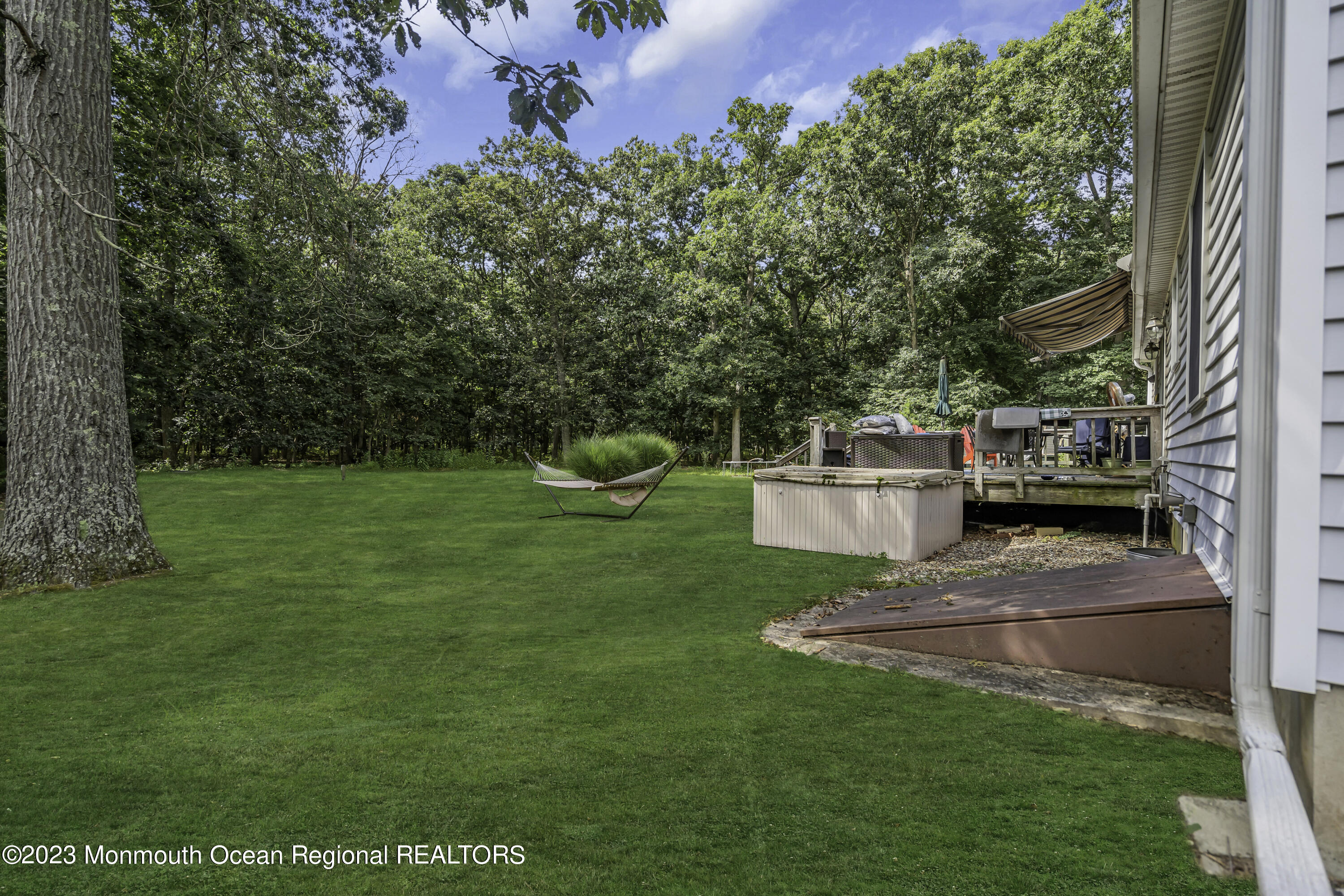 26 Frank Applegate Road Jackson, NJ 08527 - Photo 12 of 16 a view of a backyard with a garden