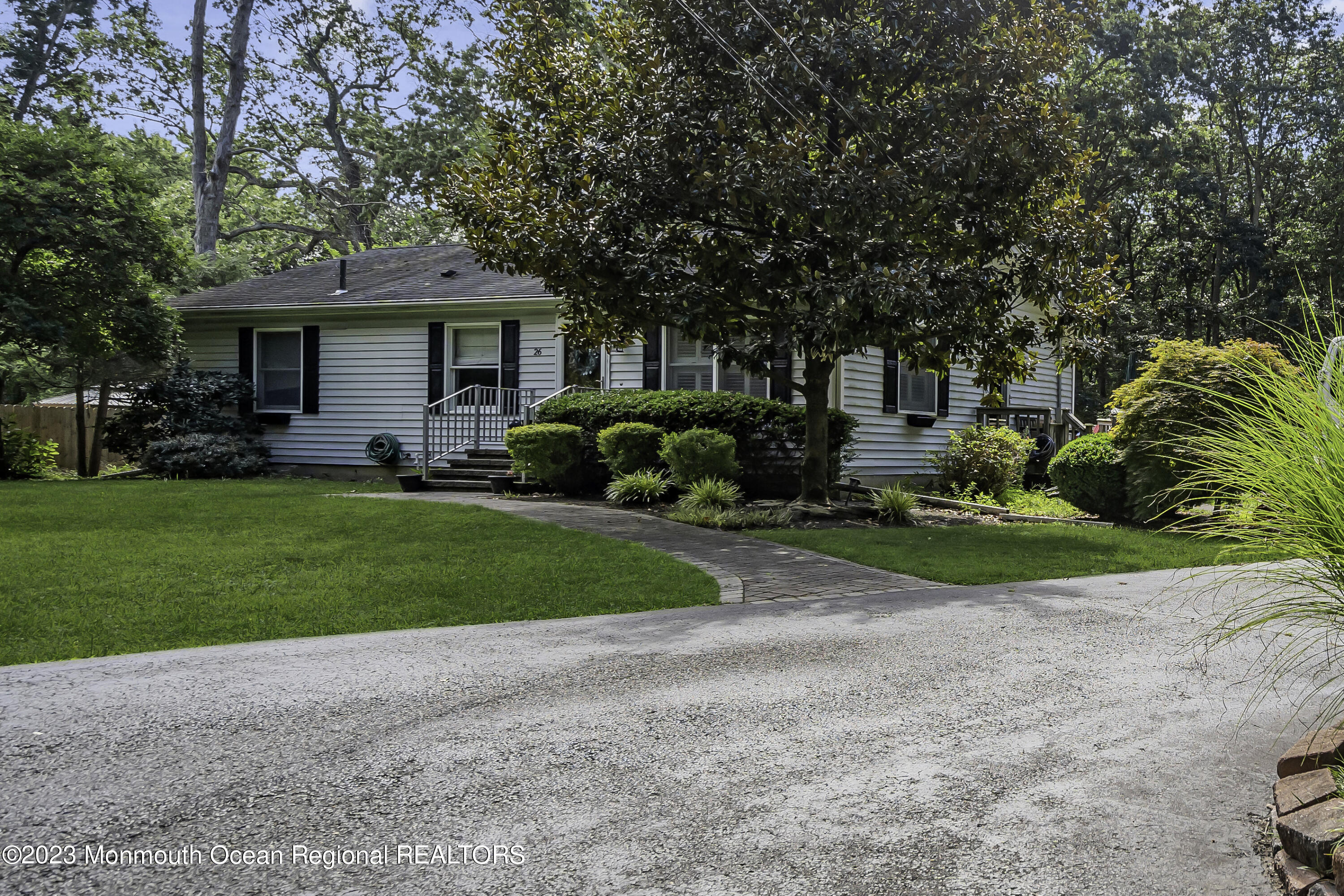26 Frank Applegate Road Jackson, NJ 08527 - Photo 13 of 16 a front view of house with yard and green space