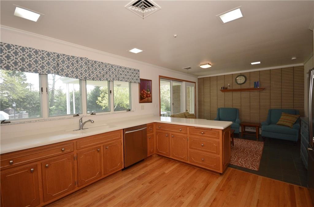 1745 Partridge Run Road Pittsburgh, PA 15241 - Photo 8 of 25 The spacious sunlit kitchen offers fantastic counter and cabinet space, beautiful hardwood floors, a separate breakfast area with a door to the patio.