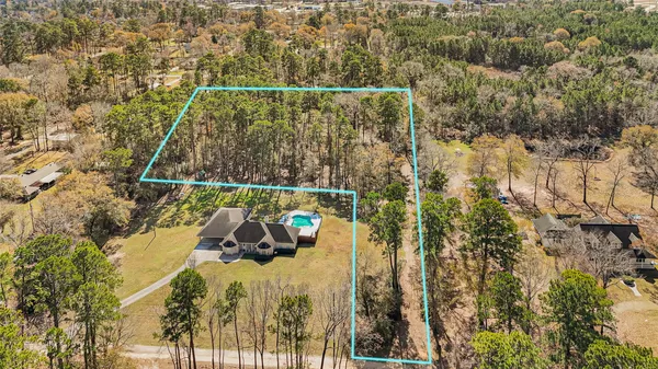 a view of balcony with two trees