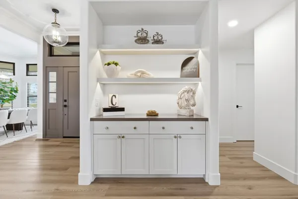 a kitchen with stainless steel appliances granite countertop a sink and cabinets