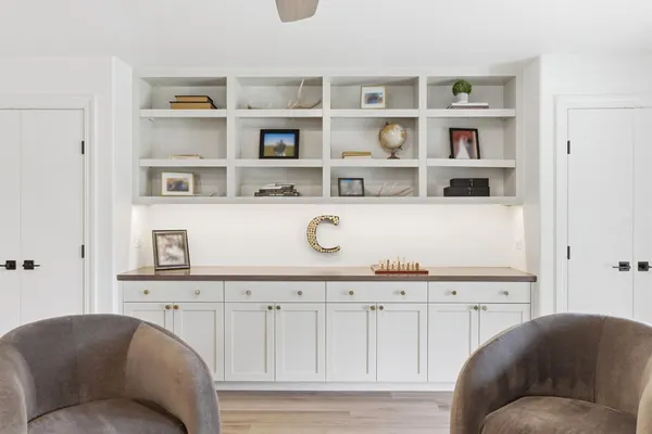 a kitchen with a sink and cabinets