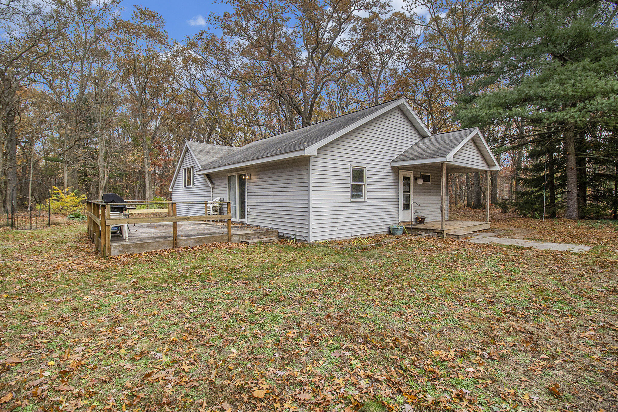 65 South Mill Iron Road Muskegon, MI 49442 - Photo 1 of 17 Front of Home