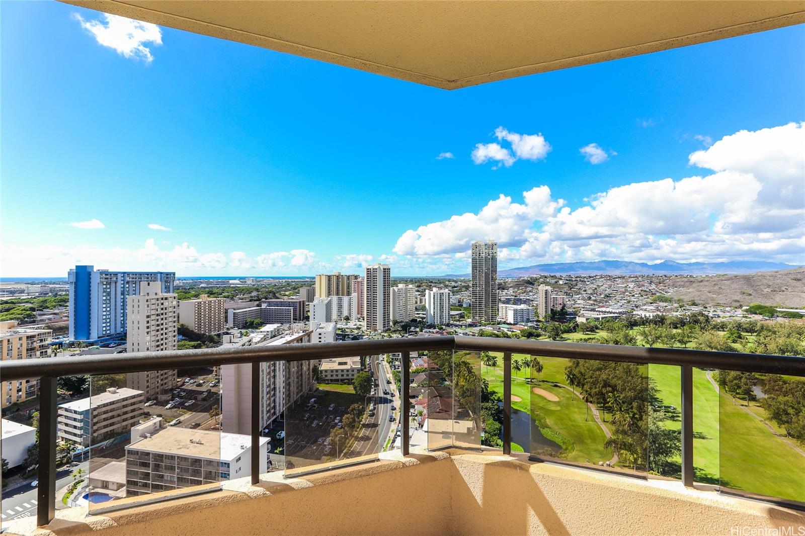 a view of a balcony with city view