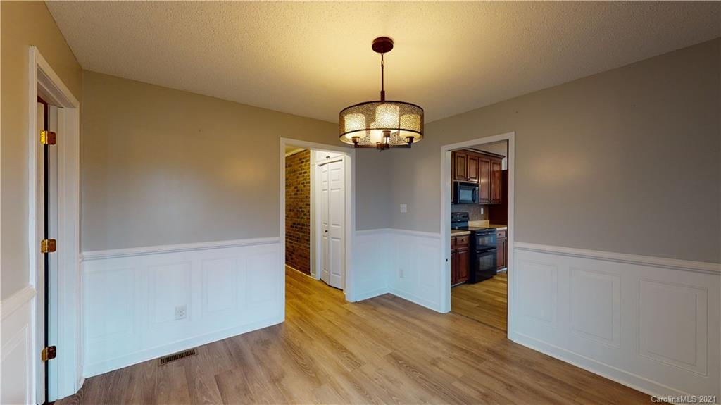960 George Brown Road Crouse, NC 28033 - Photo 13 of 31 a view of empty room with wooden floor