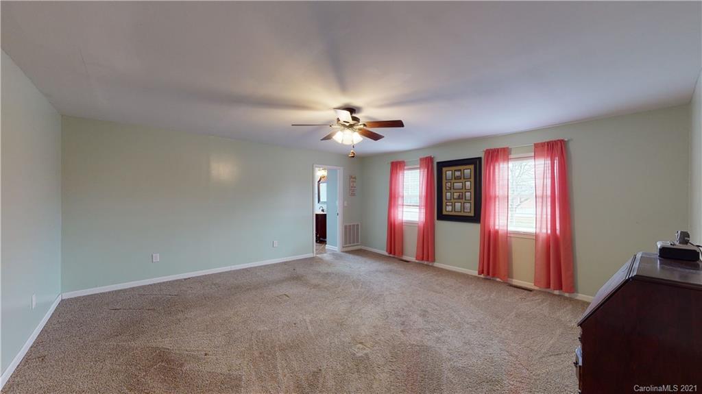 960 George Brown Road Crouse, NC 28033 - Photo 16 of 31 a view of a livingroom with a ceiling fan and window