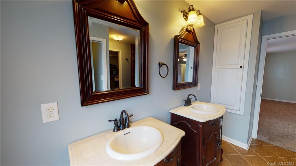 960 George Brown Road Crouse, NC 28033 - Photo 18 of 31 a bathroom with a sink and a mirror