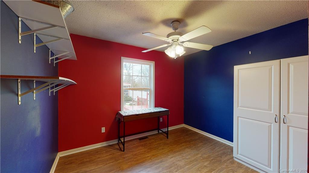 960 George Brown Road Crouse, NC 28033 - Photo 23 of 31 an empty room with windows and fan