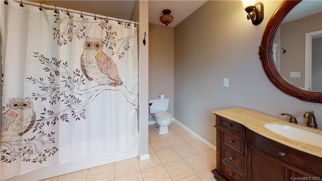 960 George Brown Road Crouse, NC 28033 - Photo 28 of 31 a spacious bathroom with a shower and a sink