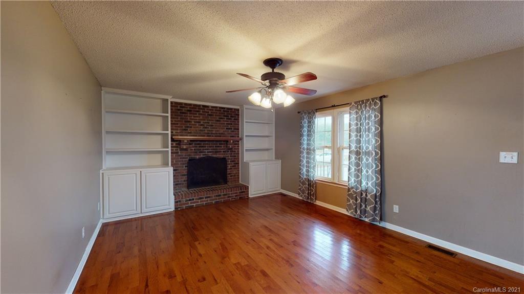 960 George Brown Road Crouse, NC 28033 - Photo 8 of 31 wooden floor in an empty room with a window