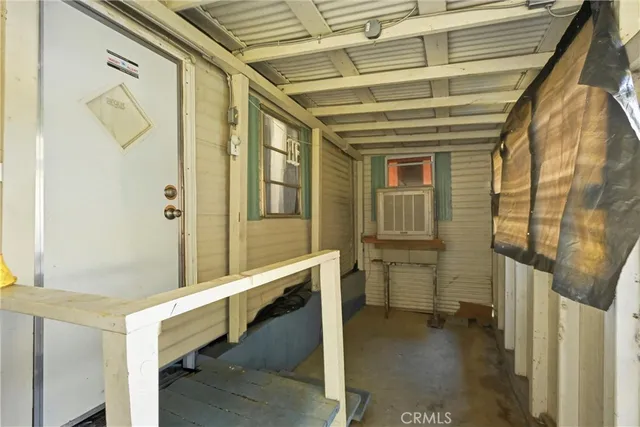 a bathroom with a tub and shower