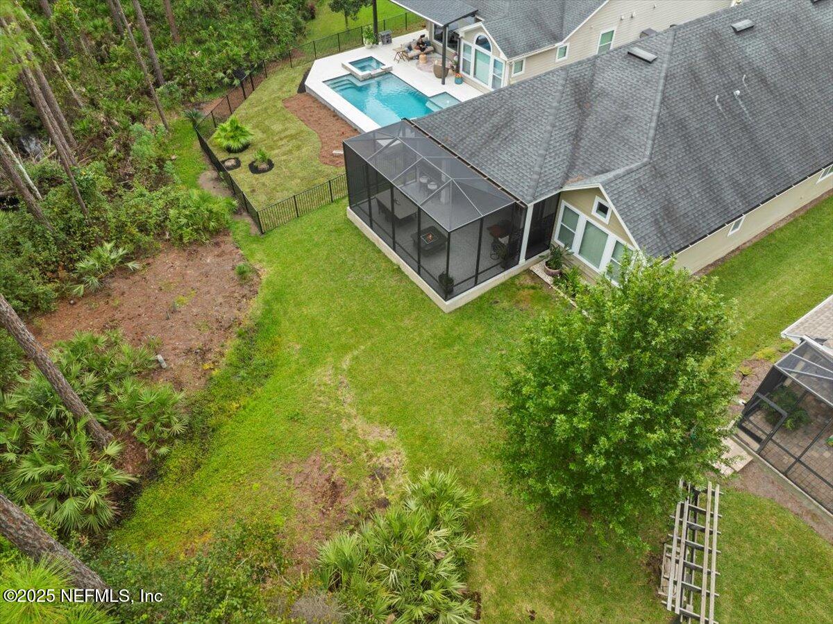 174 Beartooth Trail Ponte Vedra, FL 32081 - Photo 21 of 29 an aerial view of a house with a yard