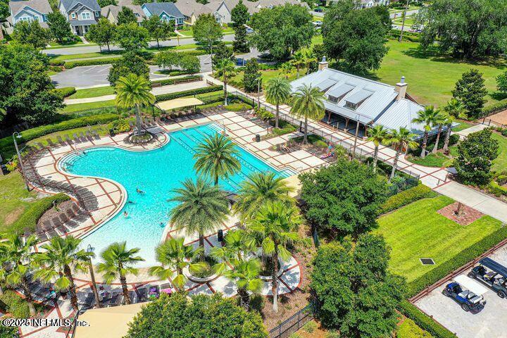 174 Beartooth Trail Ponte Vedra, FL 32081 - Photo 22 of 29 an aerial view of residential houses with outdoor space and swimming pool