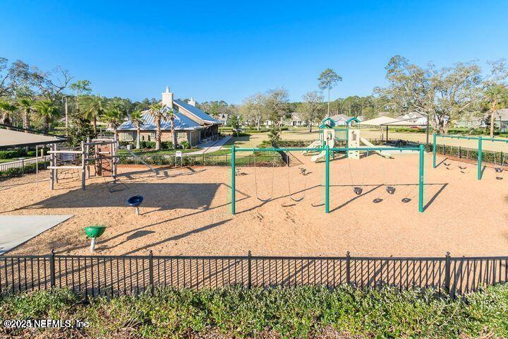 174 Beartooth Trail Ponte Vedra, FL 32081 - Photo 23 of 29 a view of a swimming pool and a terrace