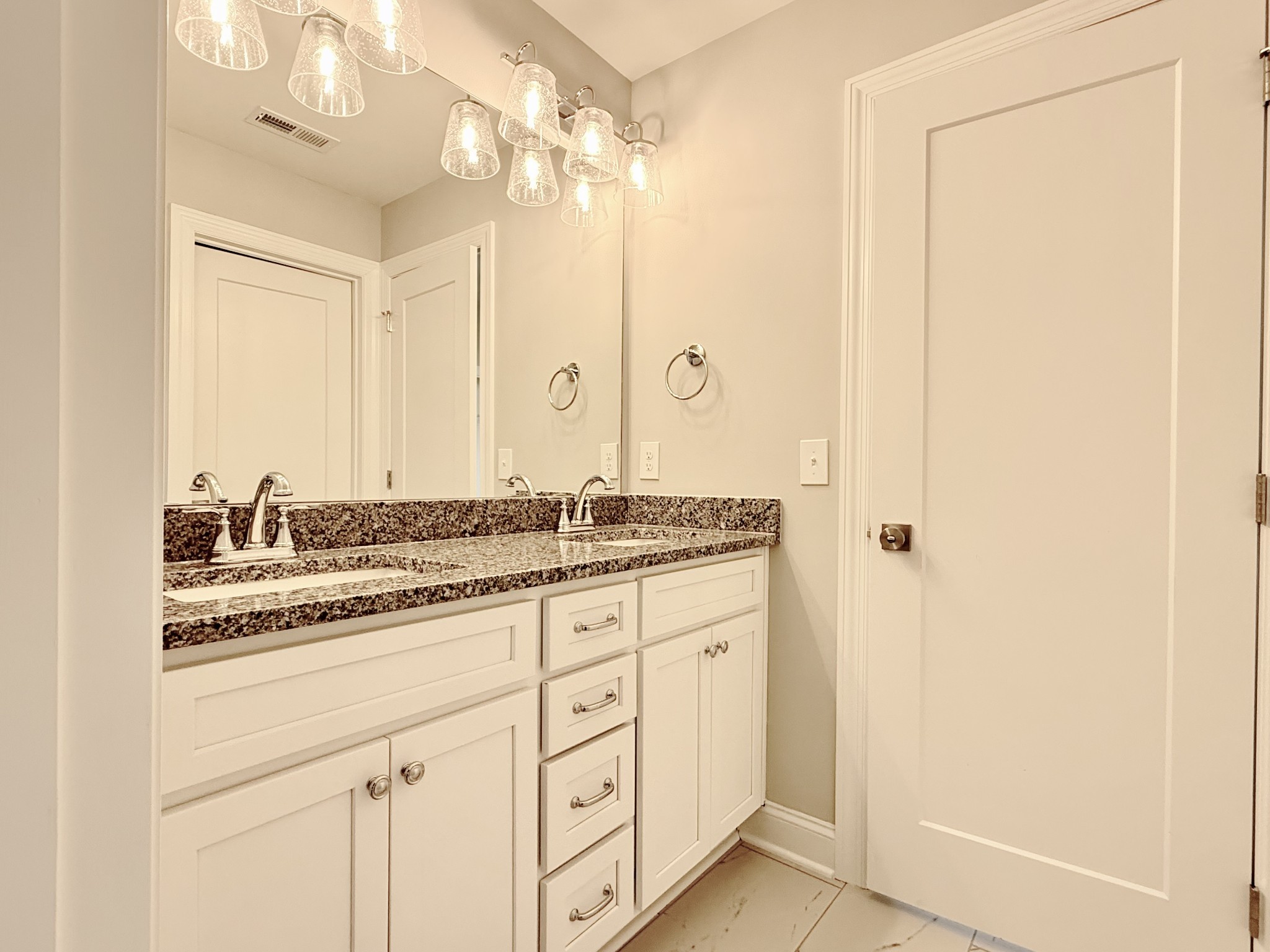 1917 Gracie Bug Loop Murfreesboro, TN 37128 - Photo 14 of 27 a bathroom with a granite countertop sink and a mirror