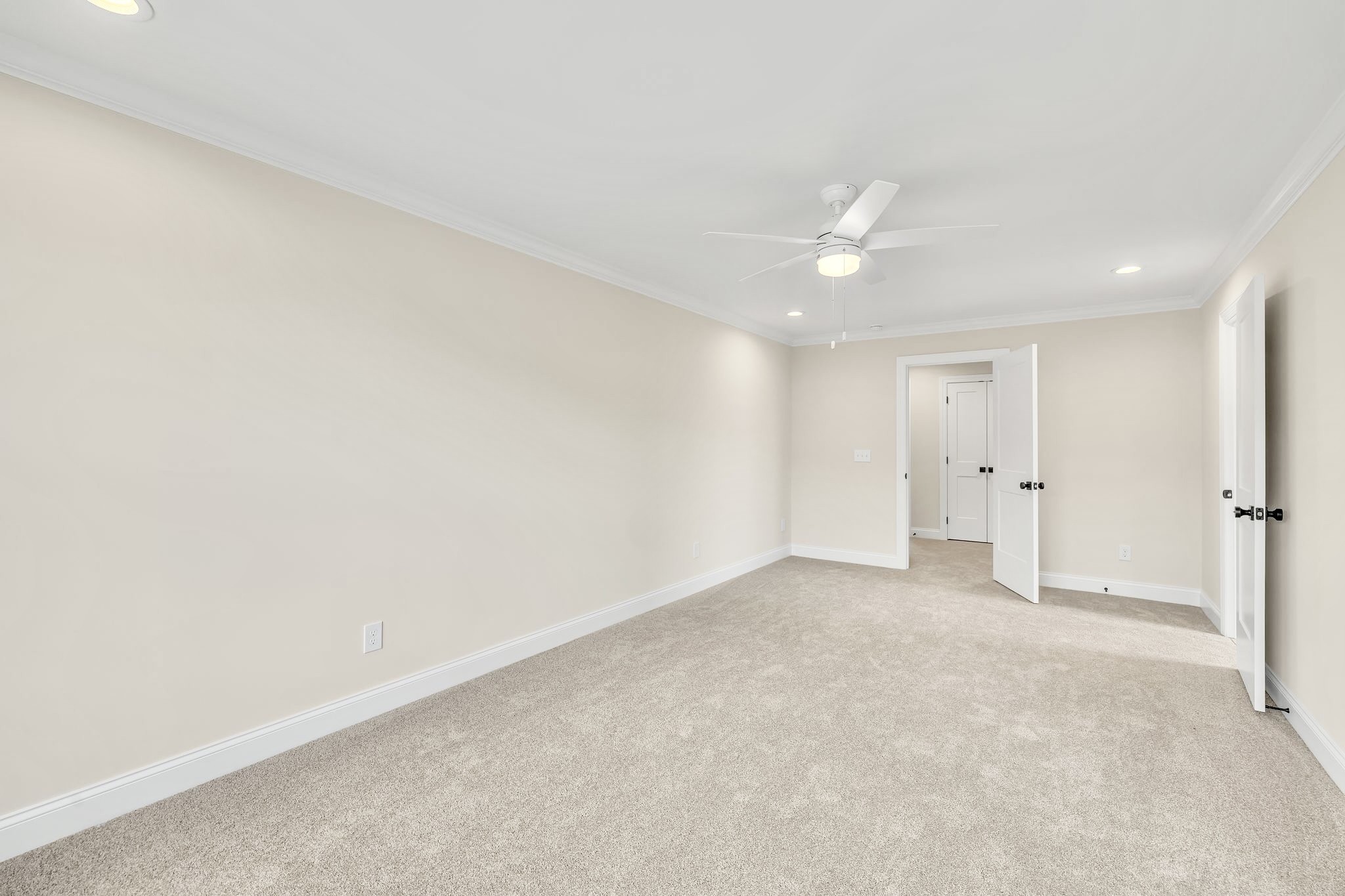 1917 Gracie Bug Loop Murfreesboro, TN 37128 - Photo 19 of 27 an empty room with a ceiling fan and a window
