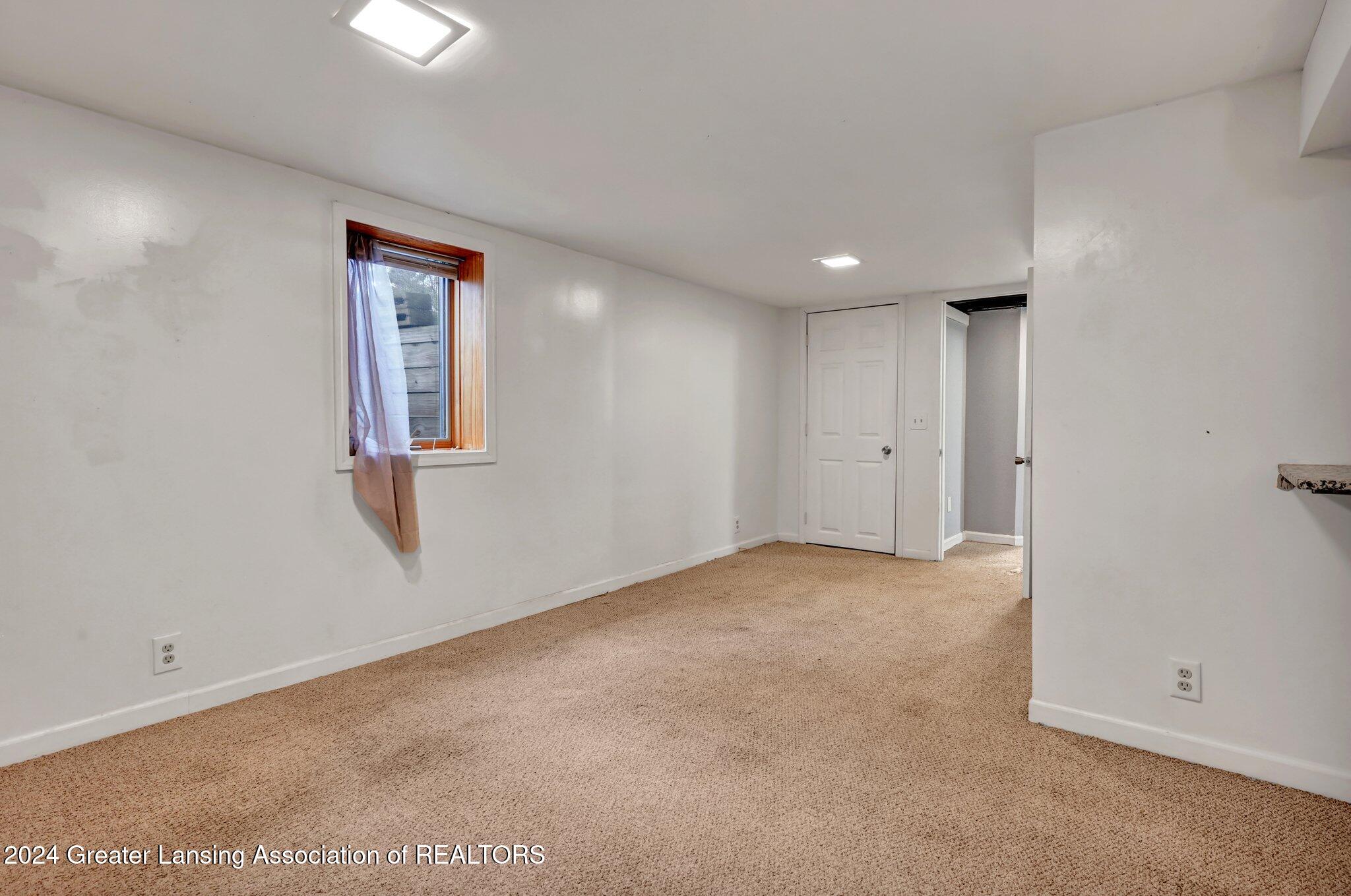 3518 Ruth Avenue Lansing, MI 48910 - Photo 26 of 38 11. Bedroom 4, Lower Level