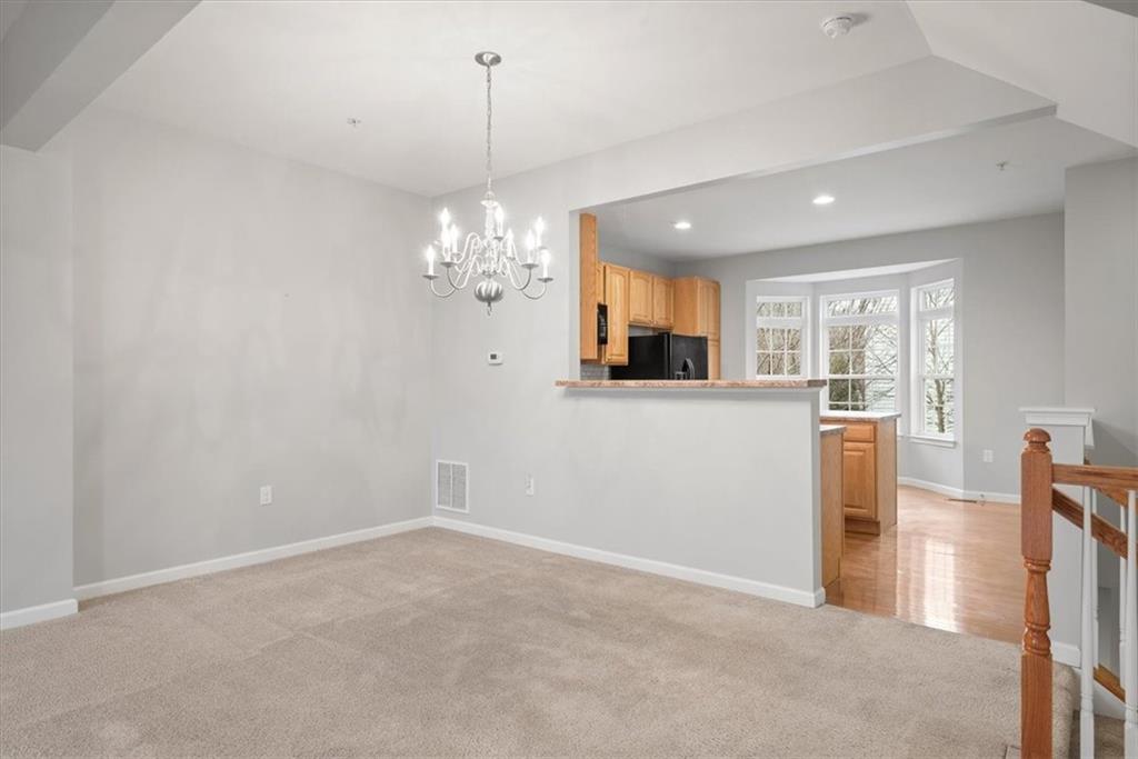 115 Lewisham Road Cranberry Township, PA 16066 - Photo 11 of 38 a view of a kitchen with refrigerator and window