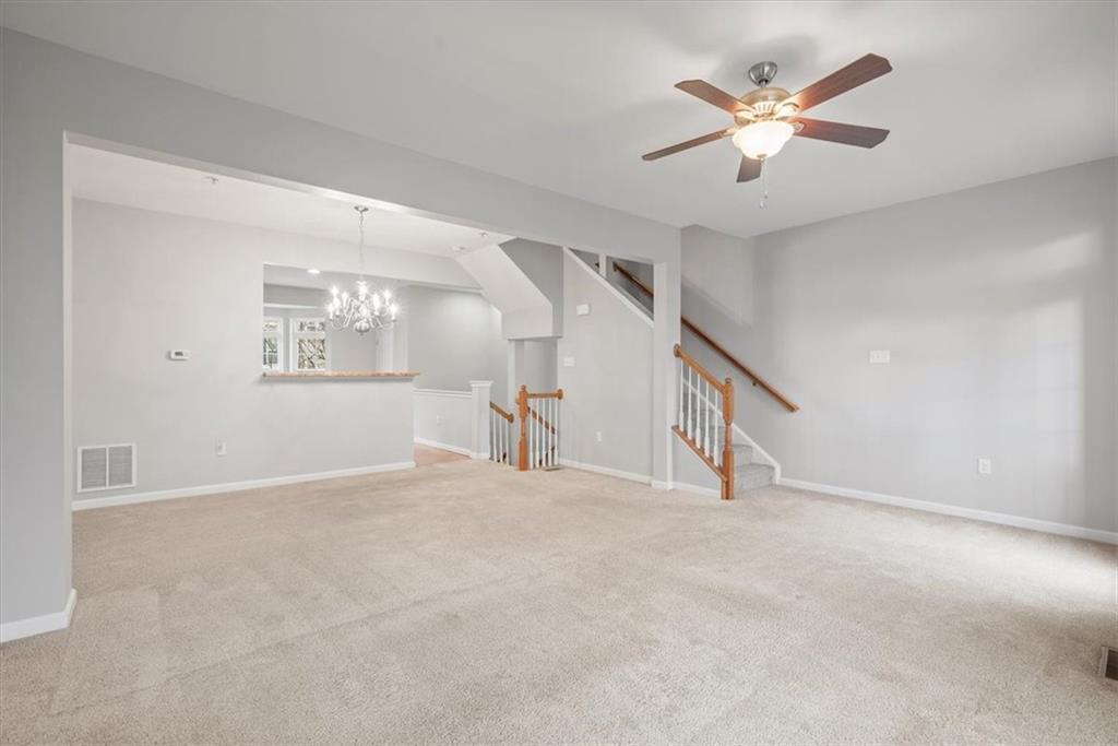 115 Lewisham Road Cranberry Township, PA 16066 - Photo 15 of 38 an empty room with windows and fan