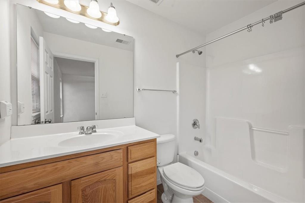 115 Lewisham Road Cranberry Township, PA 16066 - Photo 24 of 38 a bathroom with a sink toilet a mirror and shower
