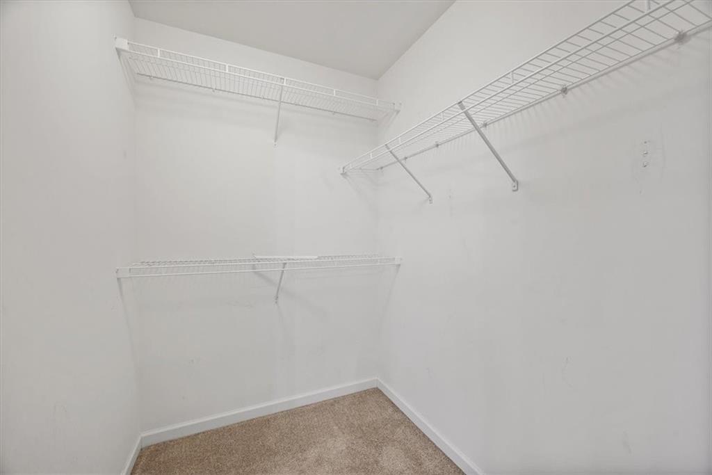 115 Lewisham Road Cranberry Township, PA 16066 - Photo 25 of 38 a view of a room with racks on the wall