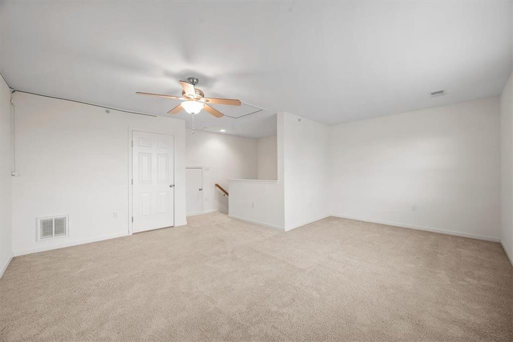 115 Lewisham Road Cranberry Township, PA 16066 - Photo 26 of 38 a view of an empty room with a ceiling fan and window