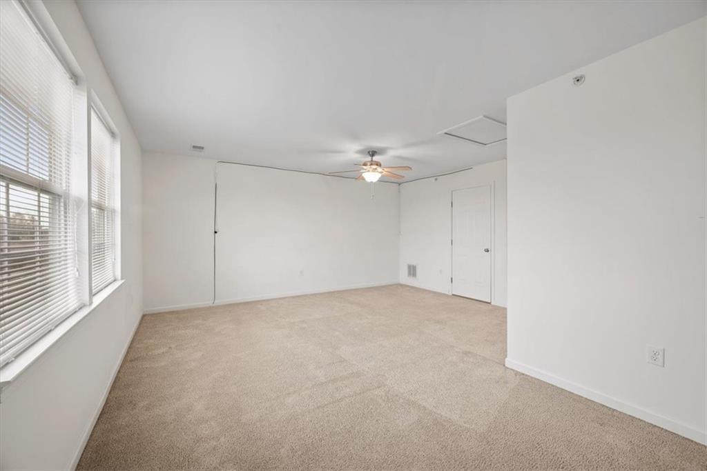 115 Lewisham Road Cranberry Township, PA 16066 - Photo 27 of 38 an empty room with chandelier fan and windows