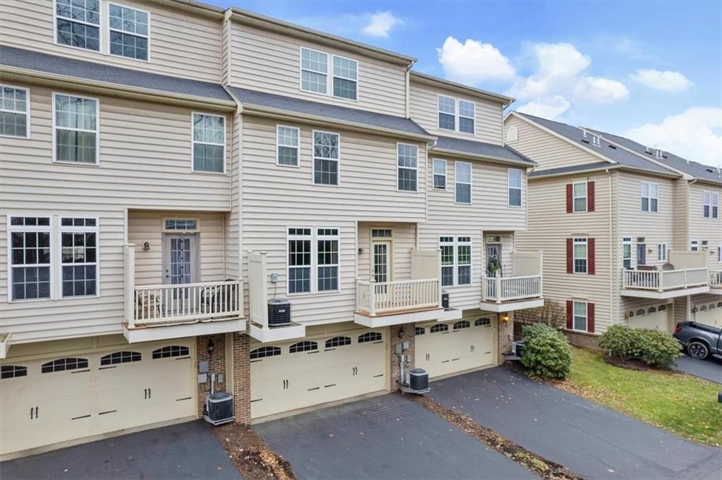115 Lewisham Road Cranberry Township, PA 16066 - Photo 34 of 38 a view of a house with a yard and sitting area