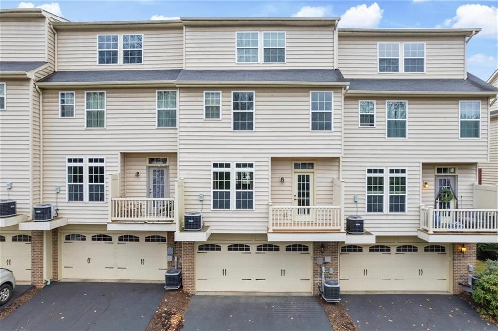 115 Lewisham Road Cranberry Township, PA 16066 - Photo 35 of 38 a backyard of a house with barbeque oven and white wooden cabinets