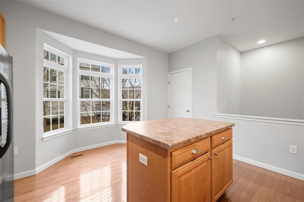 115 Lewisham Road Cranberry Township, PA 16066 - Photo 6 of 38 a kitchen with a stove a sink and a refrigerator