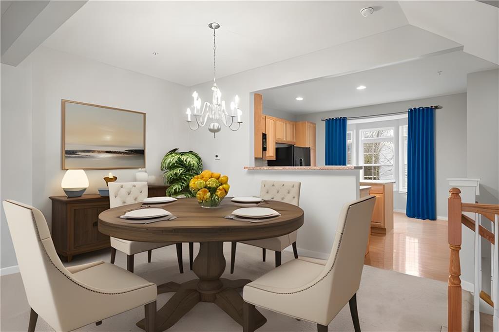 115 Lewisham Road Cranberry Township, PA 16066 - Photo 10 of 38 a view of a dining room with furniture a chandelier and wooden floor
