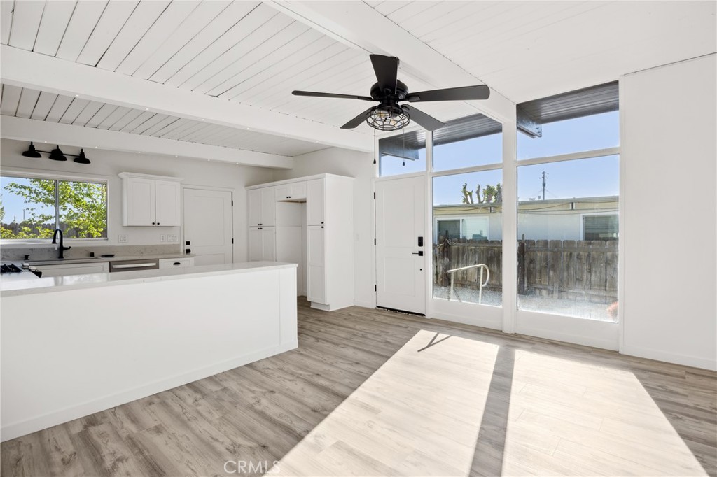 528 Creston Road Paso Robles, CA 93446 - Photo 23 of 46 a view of a kitchen with wooden floor and a ceiling fan