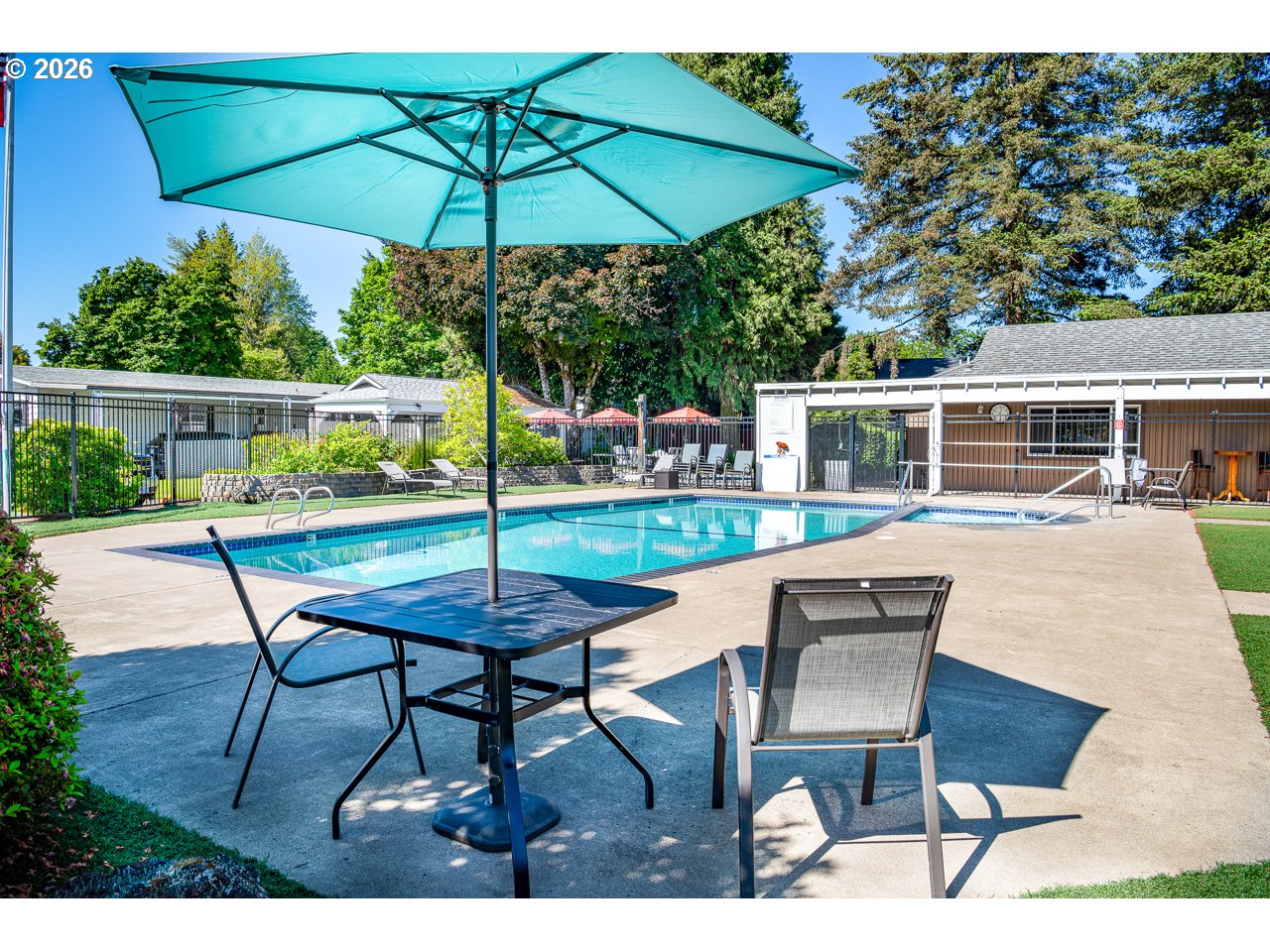 1475 Green Acres Road, Unit 172 Eugene, OR 97408 - Photo 25 of 35 a view of a patio with a table chairs and backyard