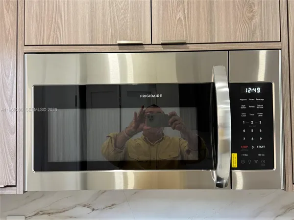 a view of swimming pool with outdoor seating