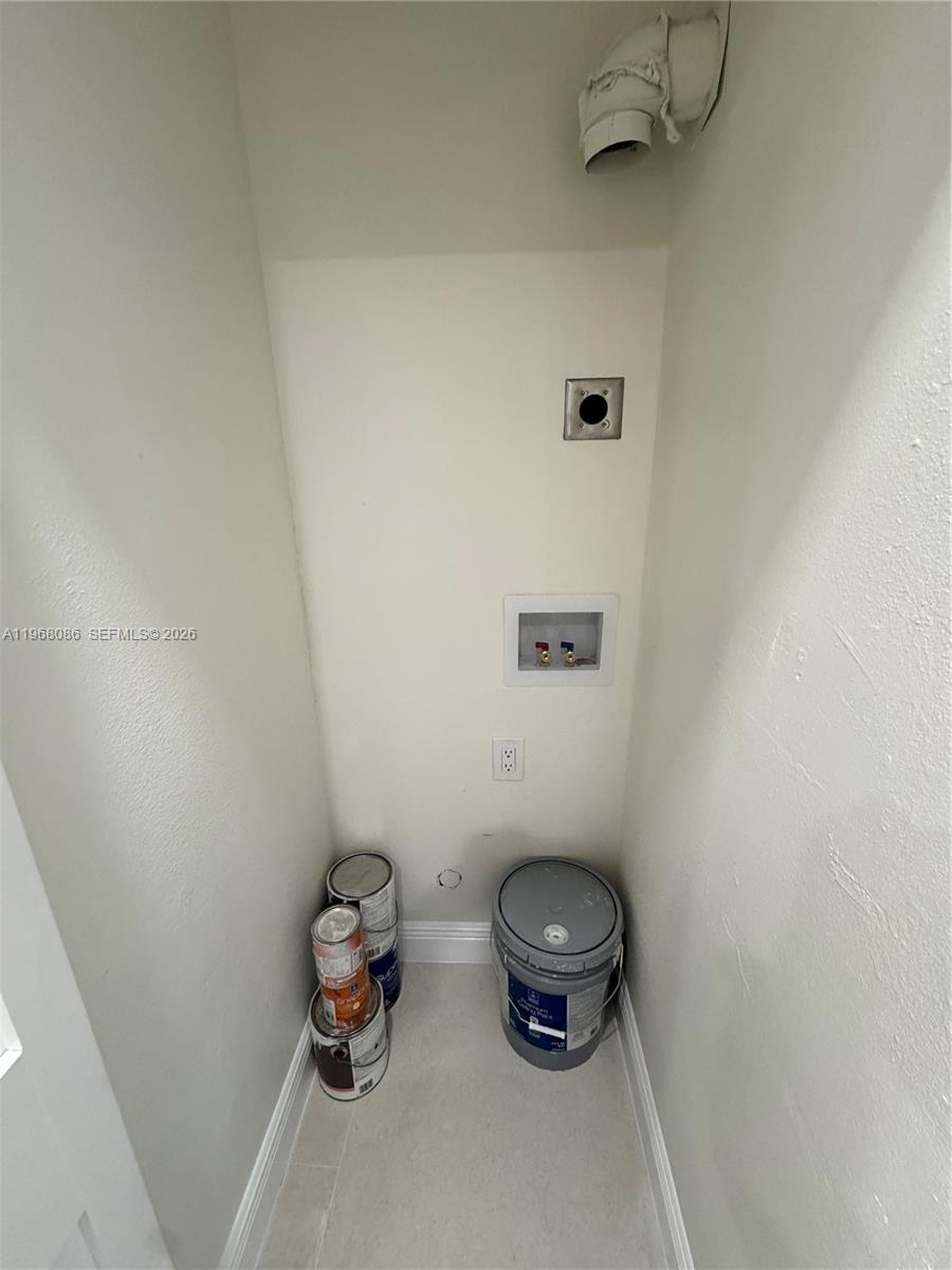 1900 West 54th Street, Unit 219 Hialeah, FL 33012 - Photo 19 of 42 a bathroom with a toilet