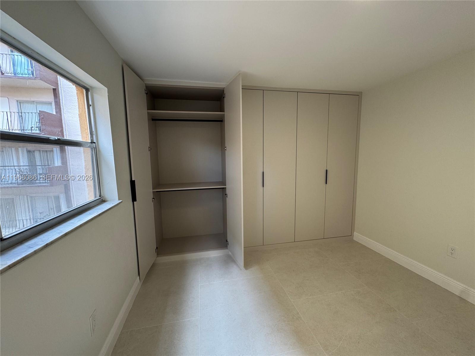 1900 West 54th Street, Unit 219 Hialeah, FL 33012 - Photo 22 of 42 a view of an empty room