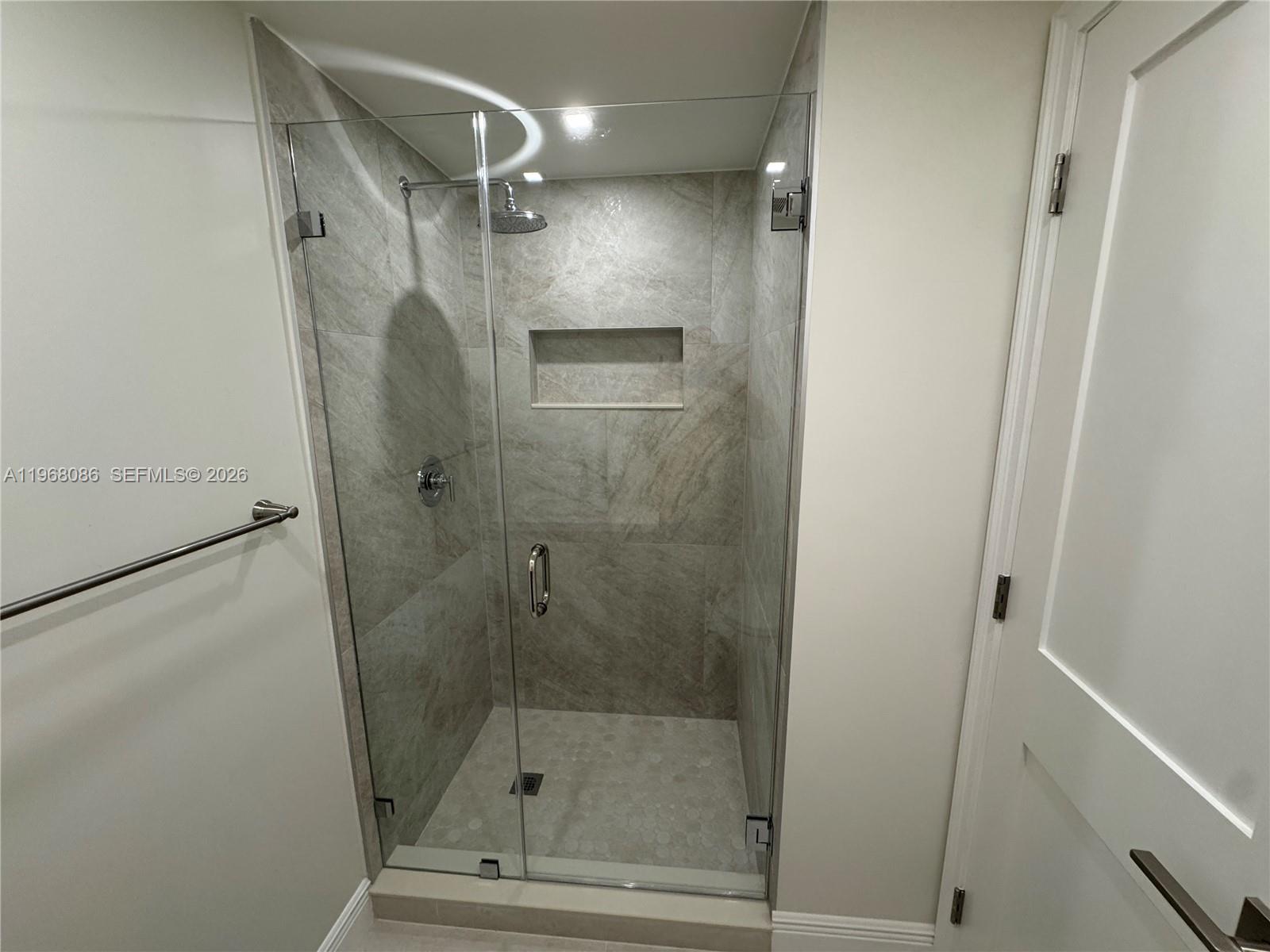1900 West 54th Street, Unit 219 Hialeah, FL 33012 - Photo 23 of 42 a bathroom with a shower