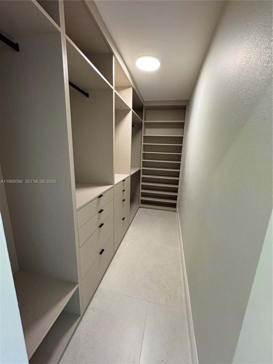 1900 West 54th Street, Unit 219 Hialeah, FL 33012 - Photo 25 of 42 a view of walk in closet