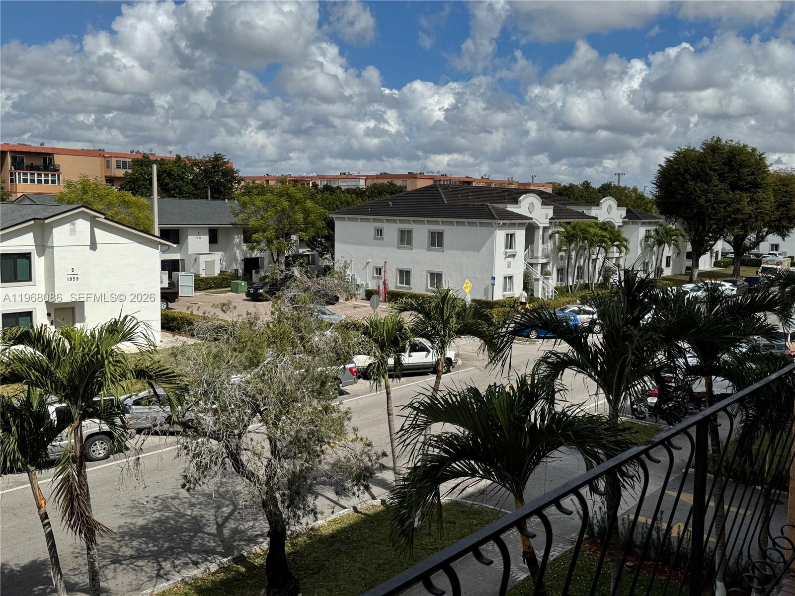1900 West 54th Street, Unit 219 Hialeah, FL 33012 - Photo 29 of 42 a view of a house with backyard and sitting area