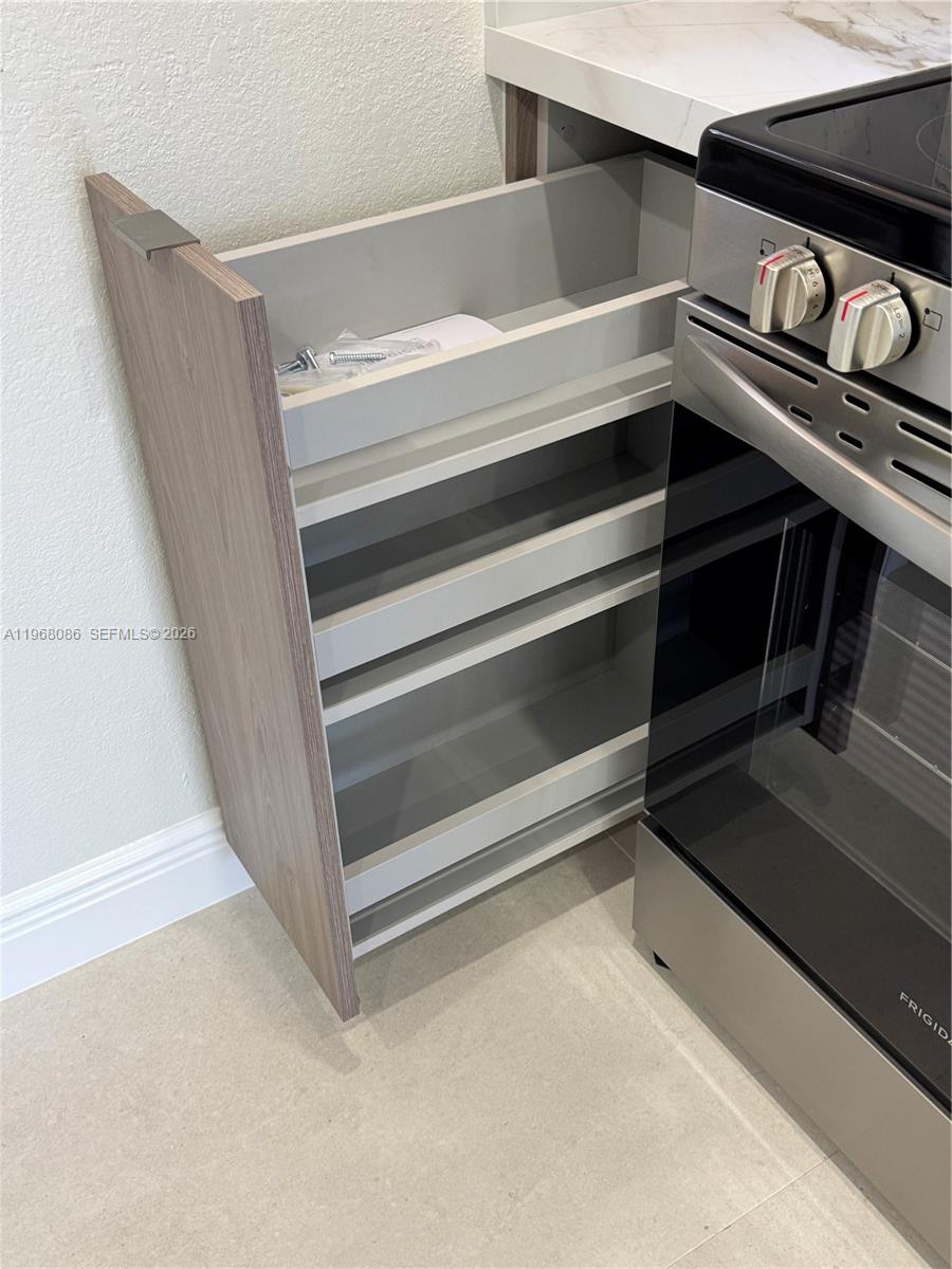 1900 West 54th Street, Unit 219 Hialeah, FL 33012 - Photo 39 of 42 a view of walk in closet