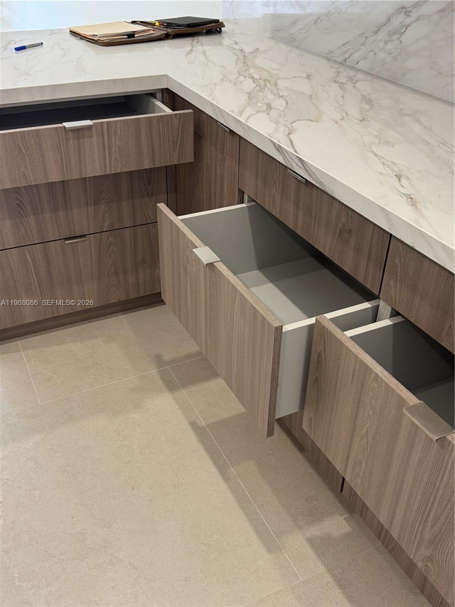 1900 West 54th Street, Unit 219 Hialeah, FL 33012 - Photo 41 of 42 a view of storage and utility room