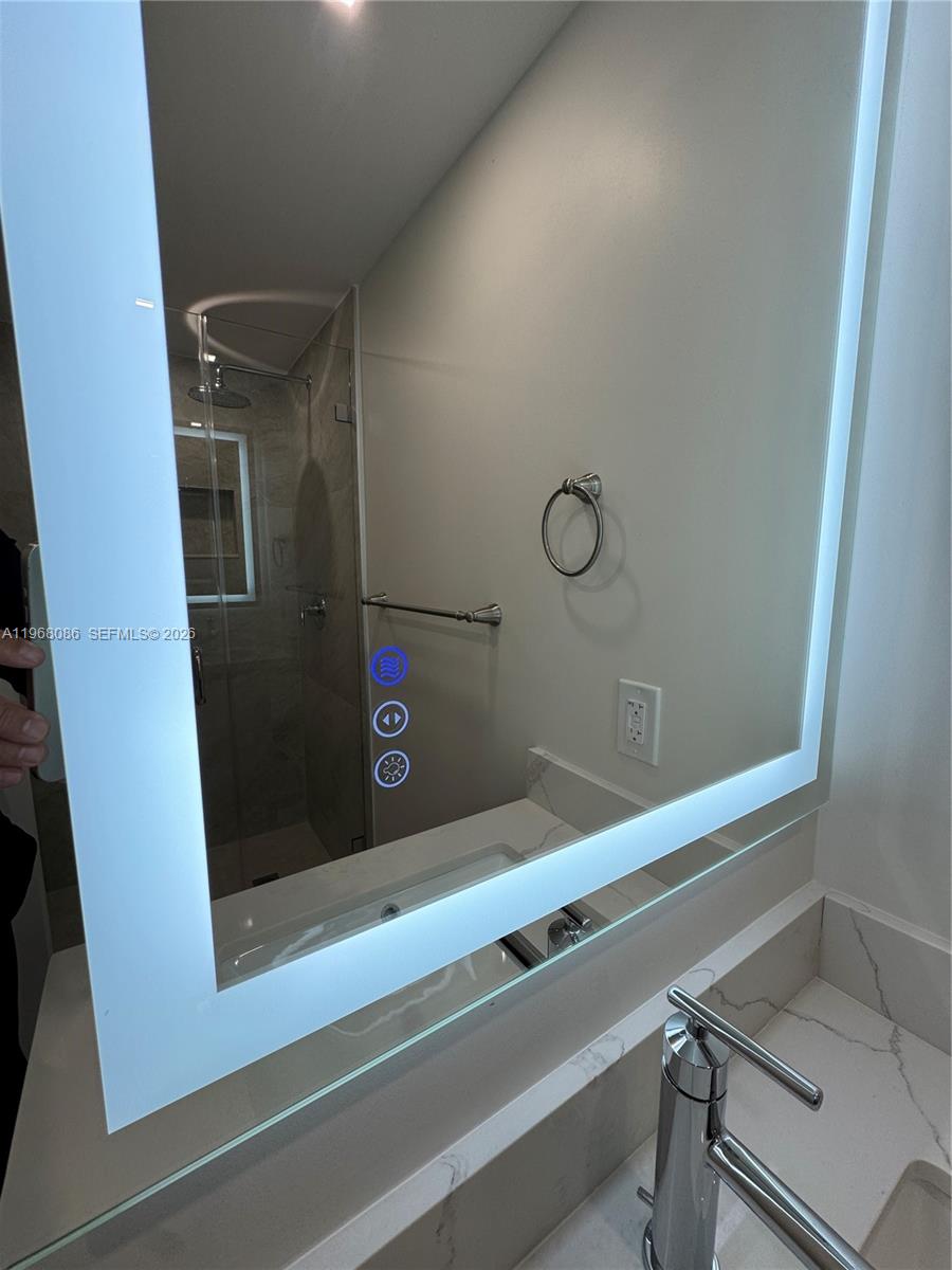 1900 West 54th Street, Unit 219 Hialeah, FL 33012 - Photo 10 of 42 a bathroom with a bathtub and shower